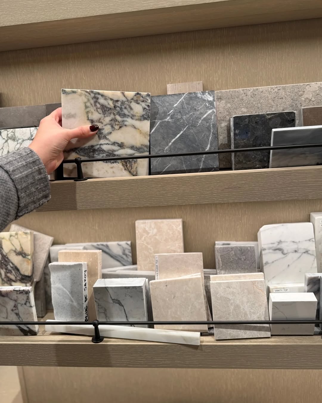 Natural stone samples displayed on a material selection rack