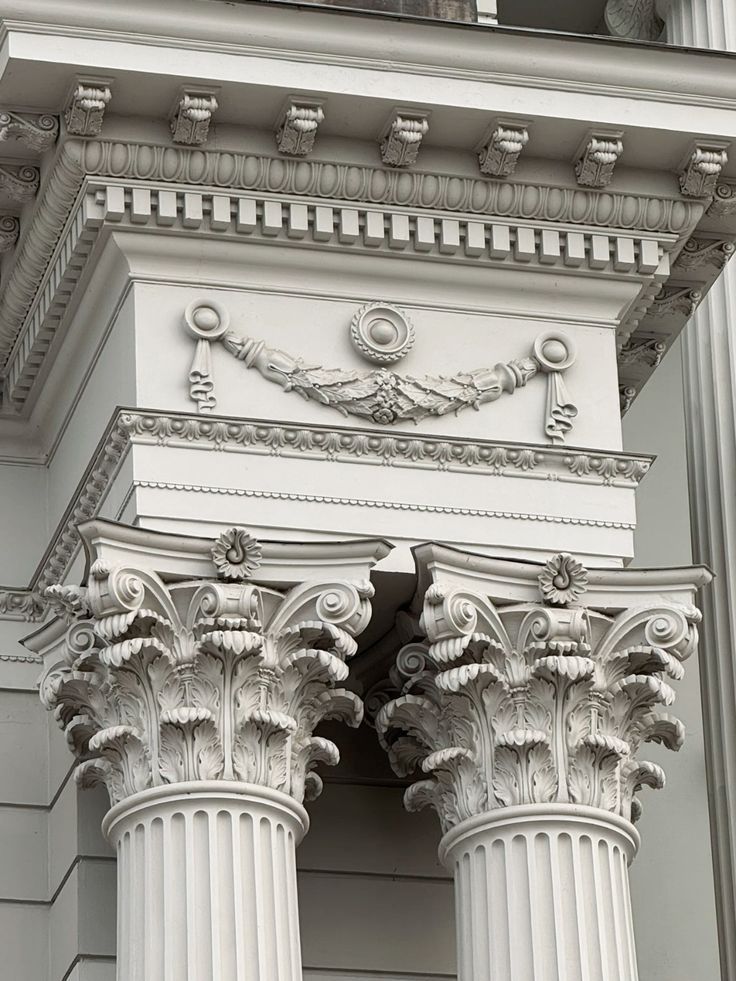 Classical stone column capitals and architectural base details