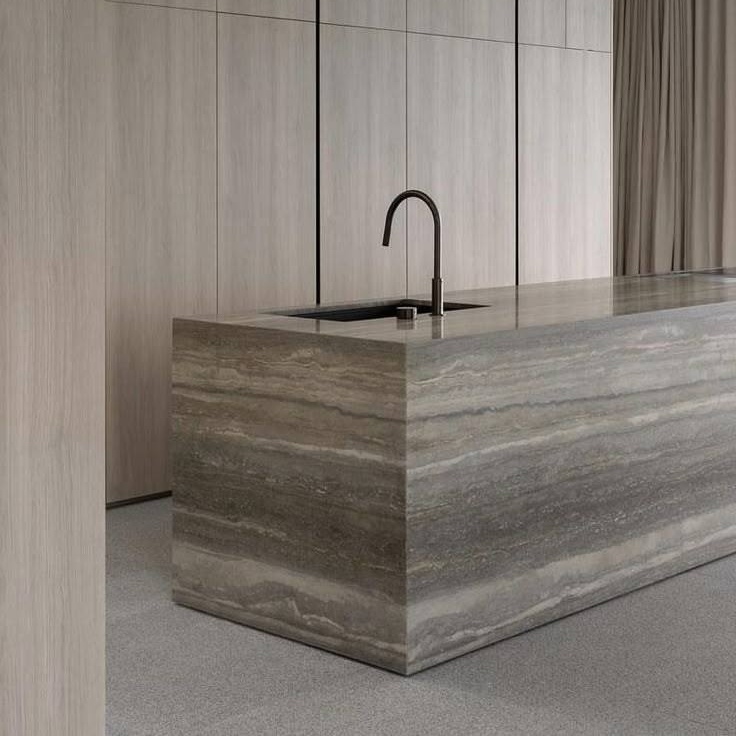 Natural stone countertop with integrated sink