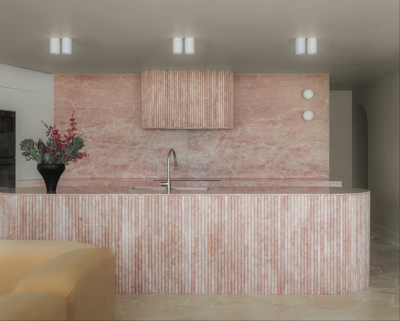 Curved pink natural stone bar counter