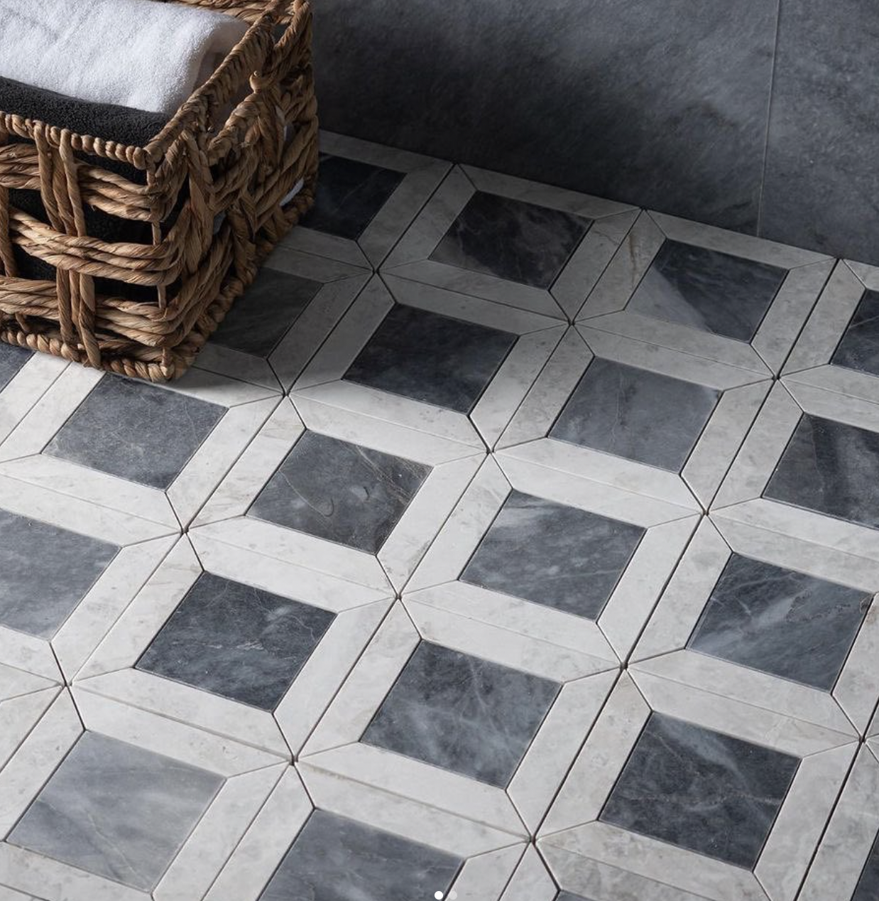 Gray and white geometric stone floor mosaic pattern