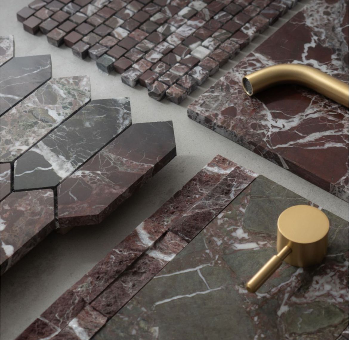 Mixed red and green stone mosaic pieces with brass accents