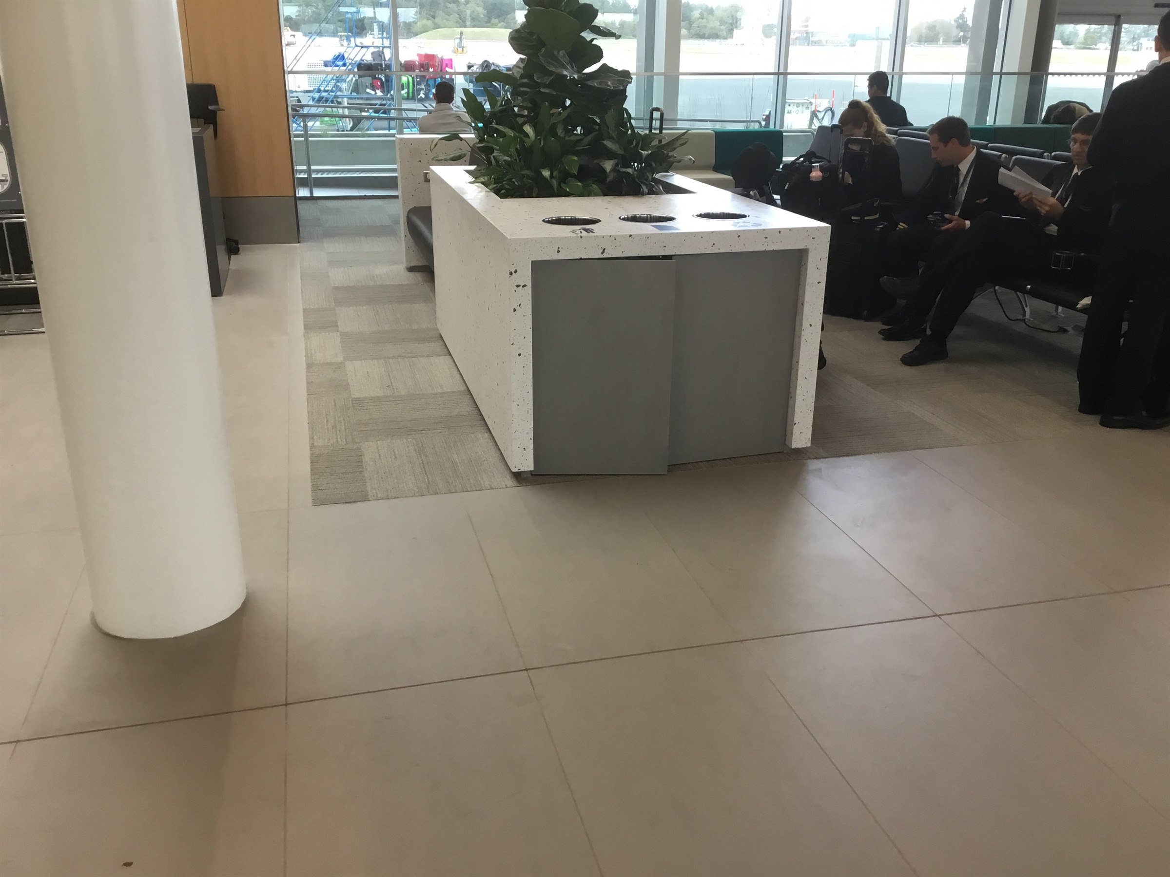 Terrazzo seating and planter detail in the airport terminal