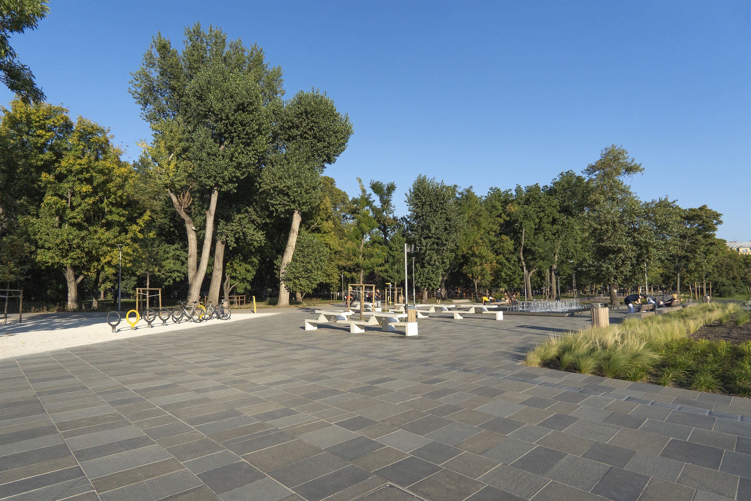 Public landscape plaza with dark grey granite paving in Budapest