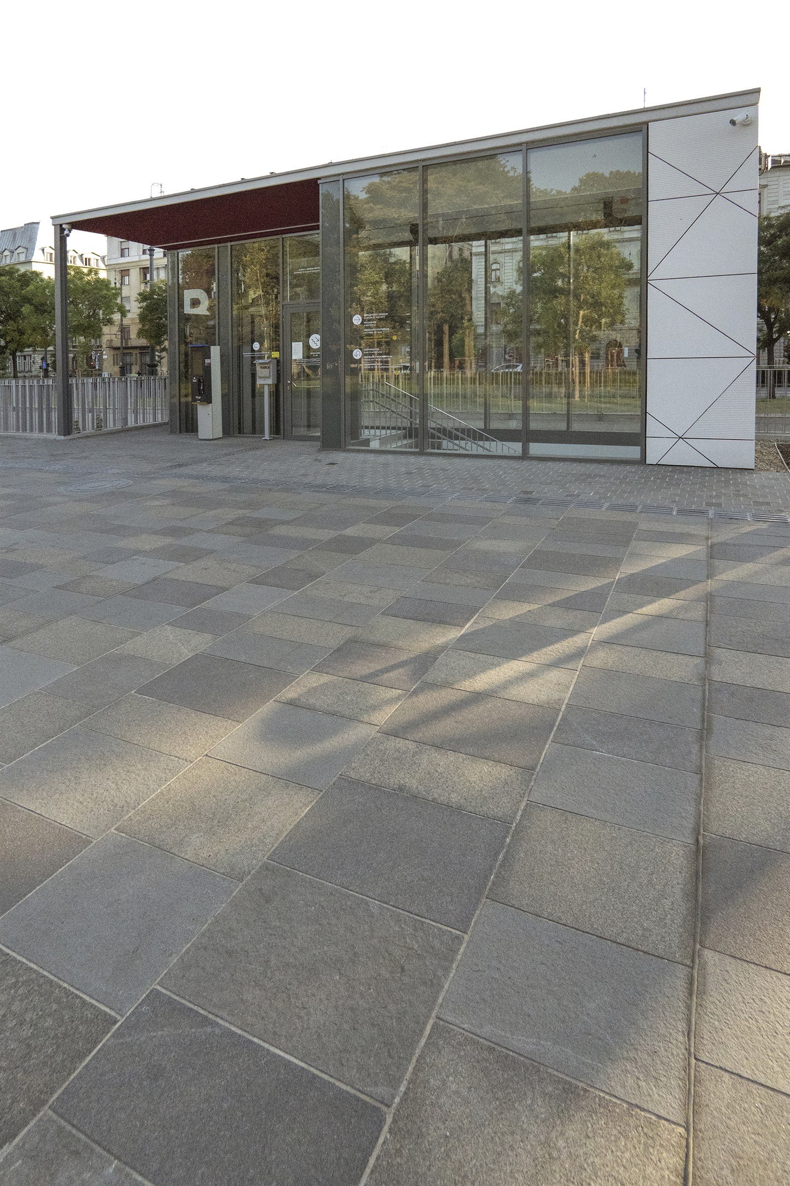 Granite pathway leading to the glass pavilion