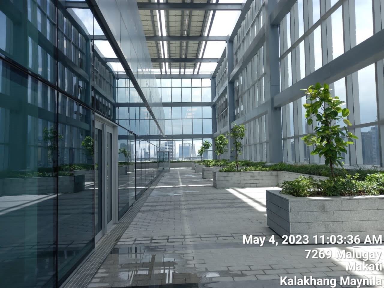 Covered garden corridor with granite paving