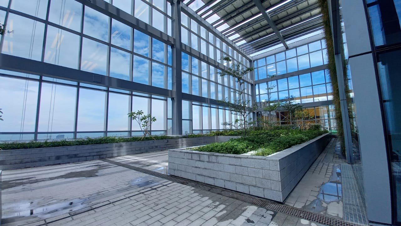 Granite paving and raised planters in the rooftop garden