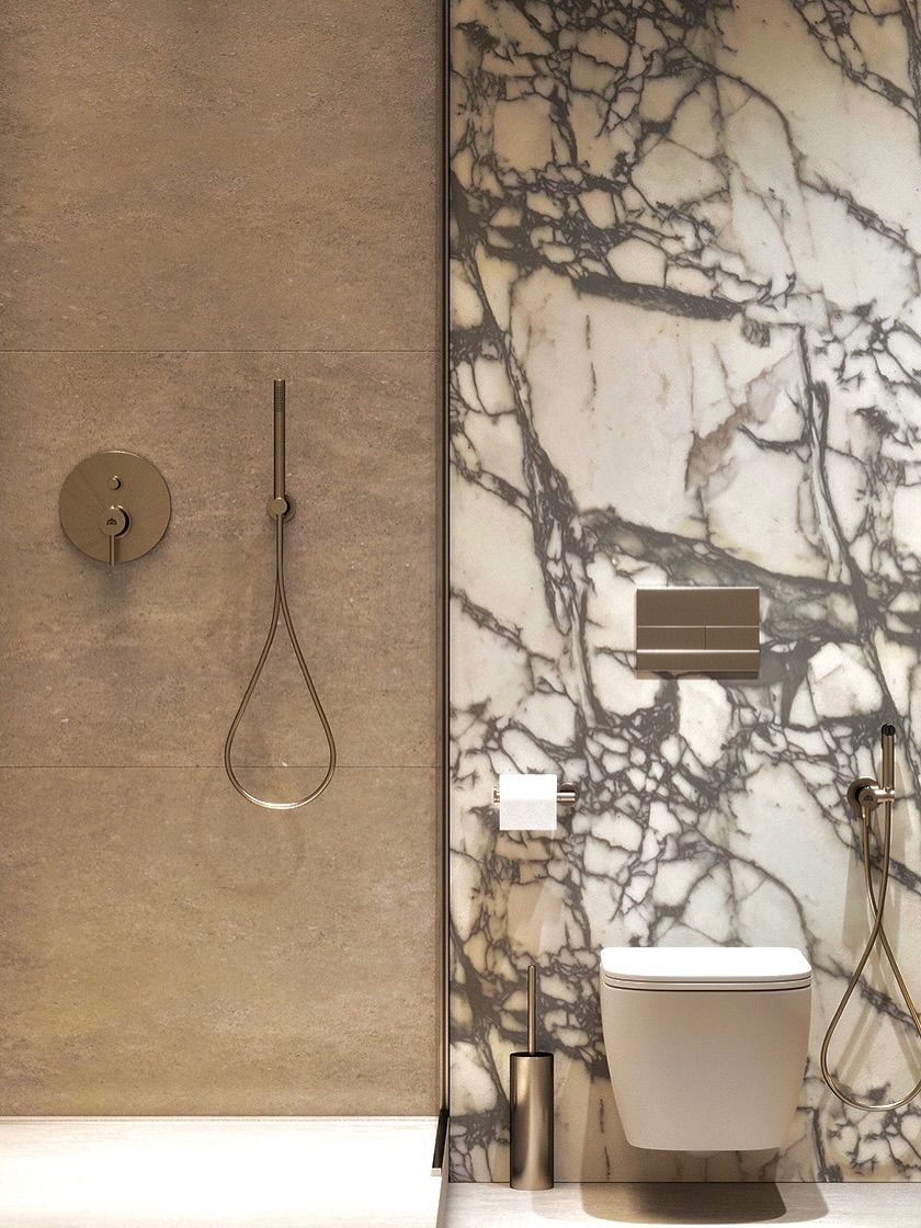 Stone-tiled shower and marble wet area